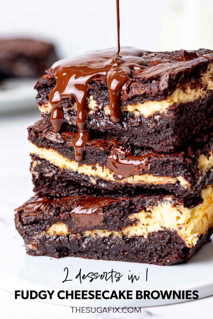 Fudgy cheesecake brownies are two desserts in one with syrup being poured on them.